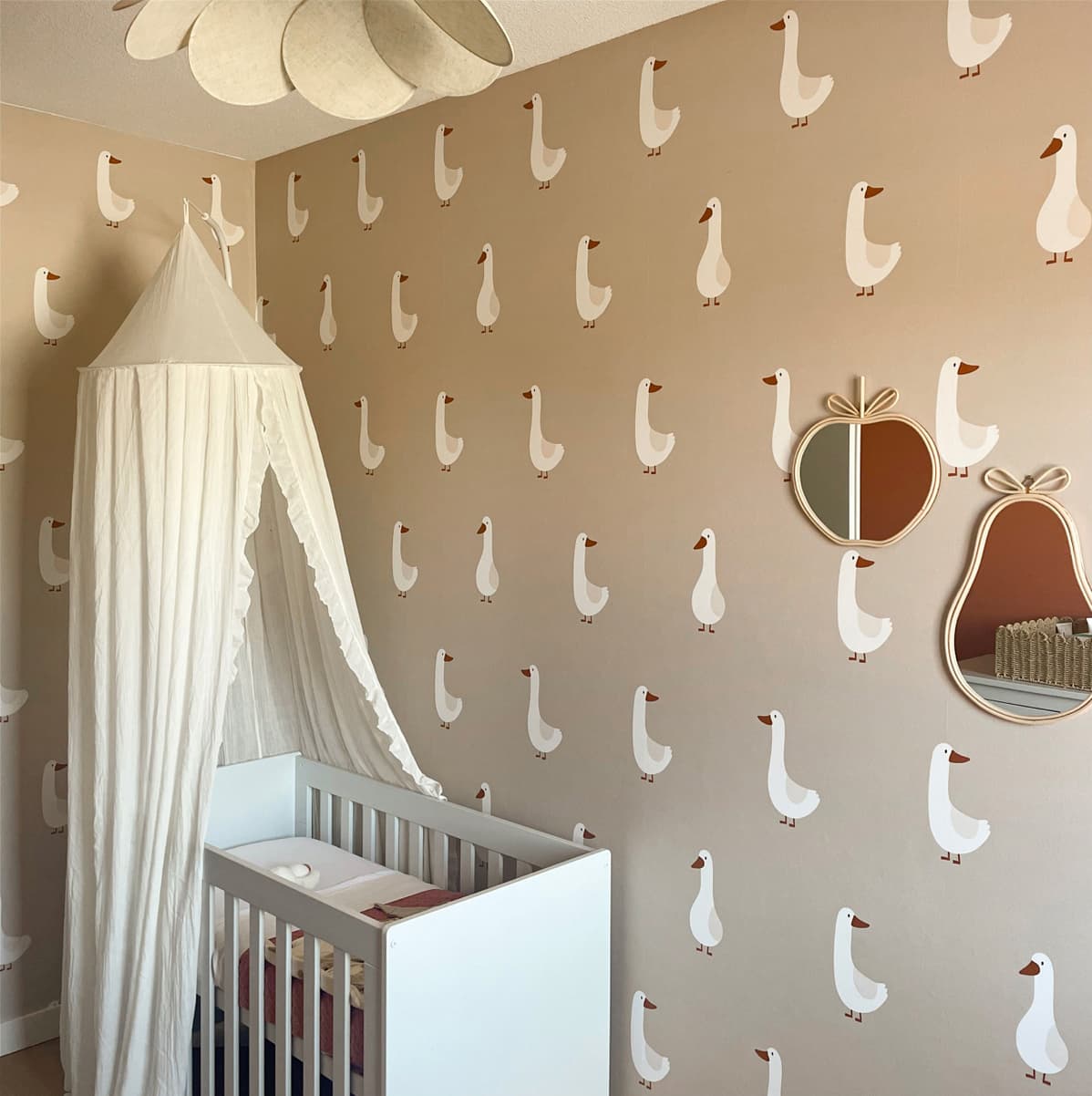 Beige children's room with geese wallpaper