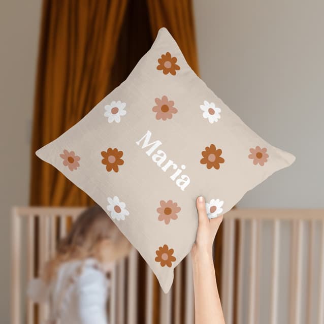 Beige children's room cushion personalized with a name